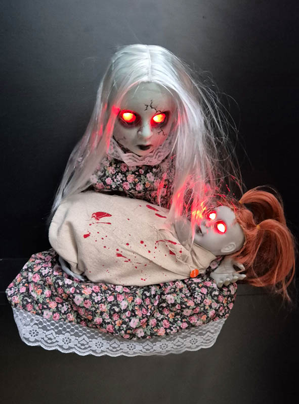 Zombie Girl with weeping Doll animated Halloween